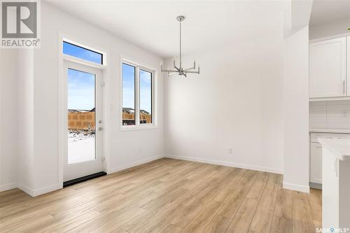 5433 Nicholson Avenue, Regina, SK - Indoor Photo Showing Other Room With Fireplace