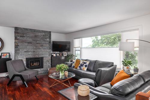 2640 Thacker Drive, West Kelowna, BC - Indoor Photo Showing Living Room With Fireplace