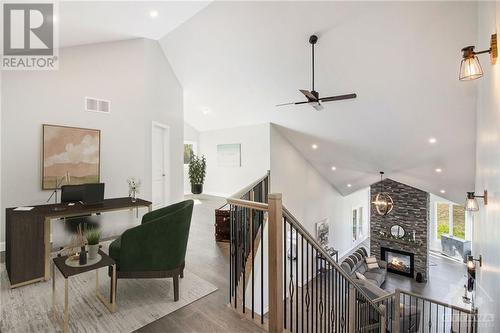 209 Des Violettes Street, Hammond, ON - Indoor Photo Showing Other Room With Fireplace