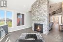 209 Des Violettes Street, Hammond, ON  - Indoor Photo Showing Living Room With Fireplace 