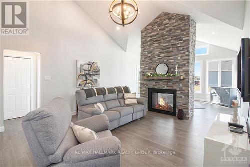 209 Des Violettes Street, Clarence-Rockland, ON - Indoor Photo Showing Living Room With Fireplace