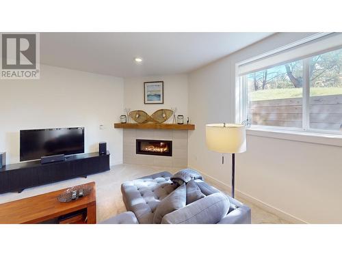 4955 Saddlewood Lane, Radium Hot Springs, BC - Indoor Photo Showing Living Room With Fireplace