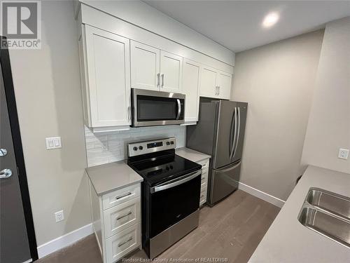 140 Main Street East Unit# 102, Kingsville, ON - Indoor Photo Showing Kitchen With Stainless Steel Kitchen With Double Sink