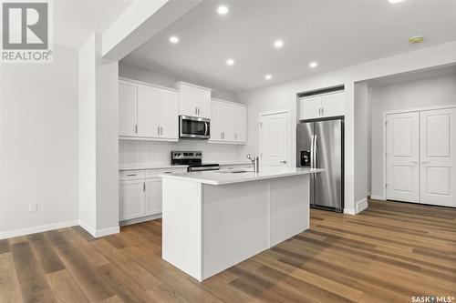 3296 Favel Drive, Regina, SK - Indoor Photo Showing Kitchen With Stainless Steel Kitchen With Upgraded Kitchen