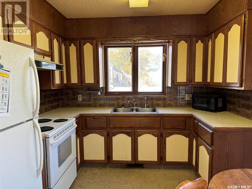 131 6Th Street, Pilot Butte, SK - Indoor Photo Showing Kitchen With Double Sink