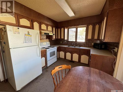 131 6Th Street, Pilot Butte, SK - Indoor Photo Showing Kitchen With Double Sink