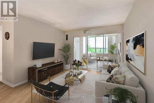 605 - 10 Malta Avenue, Brampton, ON - Indoor Photo Showing Living Room