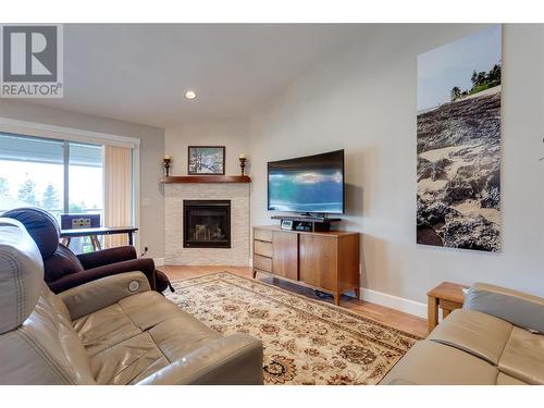 3474 Pine Valley Drive, Kelowna, BC - Indoor Photo Showing Living Room With Fireplace