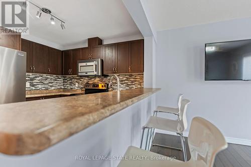 7 - 615 Rymal Road E, Hamilton, ON - Indoor Photo Showing Kitchen With Stainless Steel Kitchen With Double Sink