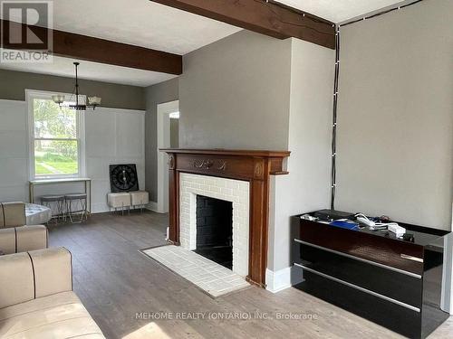 1 Catering Road, Georgina, ON - Indoor Photo Showing Other Room With Fireplace