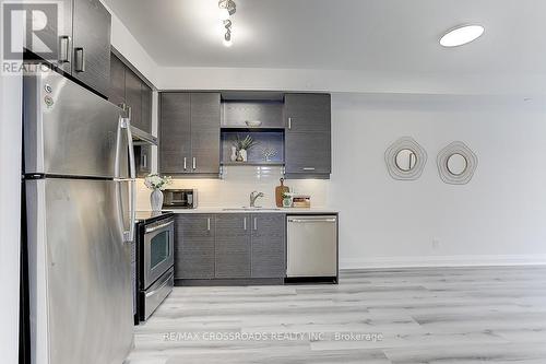 310 - 8228 Birchmount Road, Markham, ON - Indoor Photo Showing Kitchen With Upgraded Kitchen