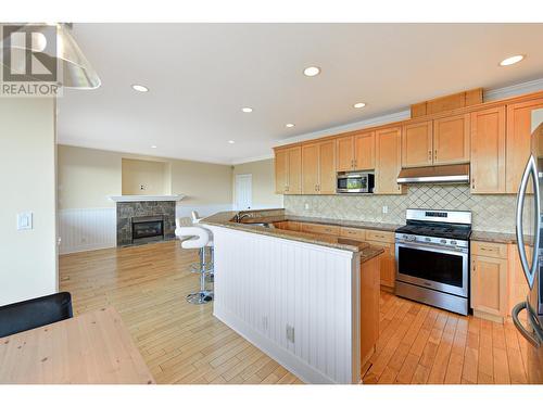 Upper Unit 1275 20Th Street, West Vancouver, BC - Indoor Photo Showing Kitchen With Fireplace