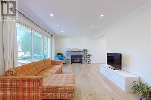 4 Honeybourne Crescent, Markham, ON - Indoor Photo Showing Living Room With Fireplace