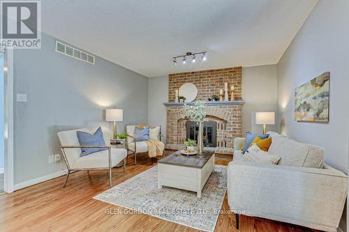 39 Sweetbriar Road, London, ON - Indoor Photo Showing Living Room With Fireplace