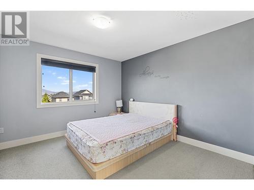 1280 Bergamot Avenue, Kelowna, BC - Indoor Photo Showing Bedroom