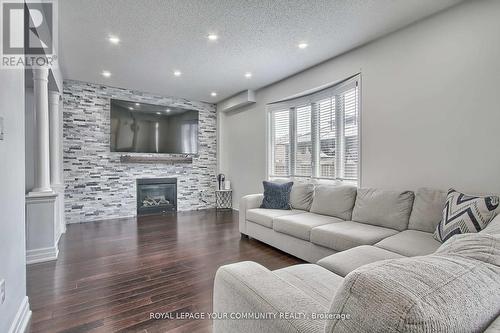 1407 Butler Street, Innisfil, ON - Indoor Photo Showing Living Room With Fireplace