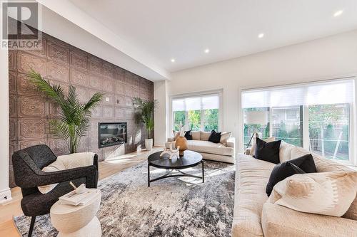 3 Arbourvale, St. Catharines, ON - Indoor Photo Showing Living Room With Fireplace