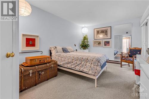 Principal bedroom opens to balcony. - 120 Lewis Street, Ottawa, ON - Indoor Photo Showing Bedroom