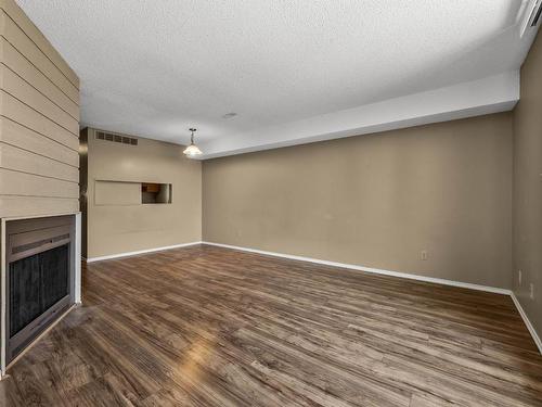 37-1750 Summit Drive, Kamloops, BC - Indoor Photo Showing Other Room With Fireplace