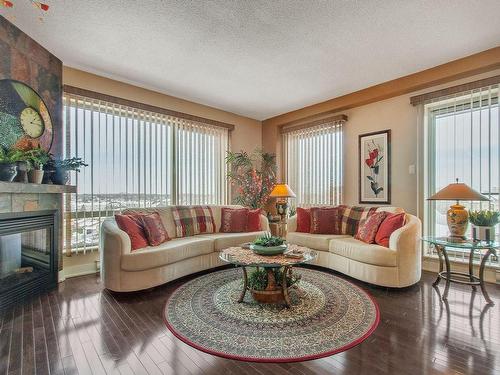 Salon - 801-4500 Ch. Des Cageux, Laval (Chomedey), QC - Indoor Photo Showing Living Room With Fireplace