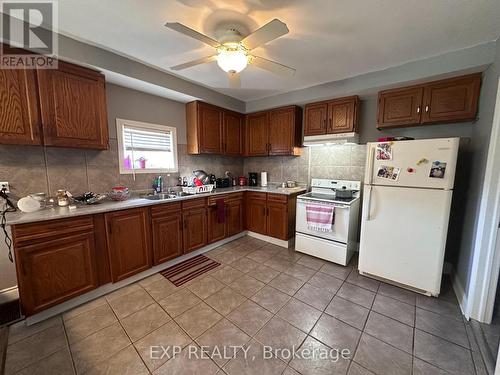 203 Grove Street, Norfolk (Simcoe), ON - Indoor Photo Showing Kitchen With Double Sink