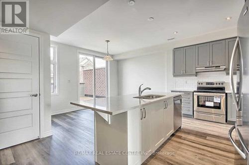 69 Fiesta Way, Whitby, ON - Indoor Photo Showing Kitchen With Stainless Steel Kitchen With Double Sink With Upgraded Kitchen