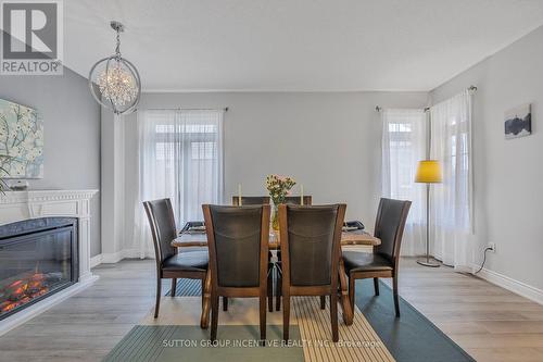 23 Pepin Court, Barrie, ON - Indoor Photo Showing Dining Room With Fireplace