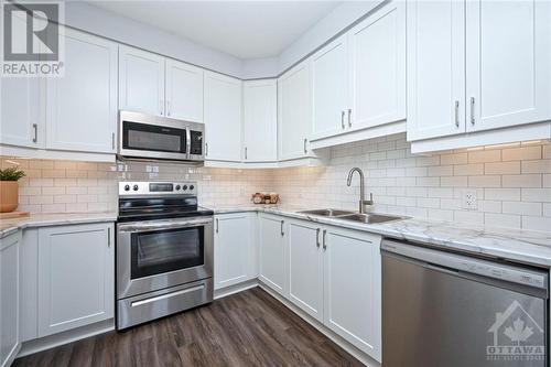 2020 Leinster Circle, Ottawa, ON - Indoor Photo Showing Kitchen With Stainless Steel Kitchen With Double Sink With Upgraded Kitchen