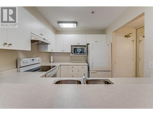 3320 Centennial Drive Unit# 409, Vernon, BC - Indoor Photo Showing Kitchen With Double Sink