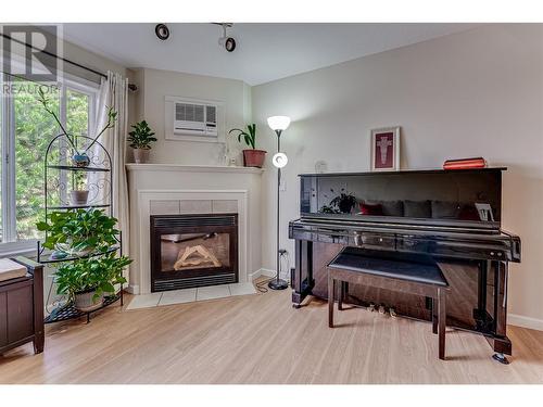 3320 Centennial Drive Unit# 409, Vernon, BC - Indoor With Fireplace