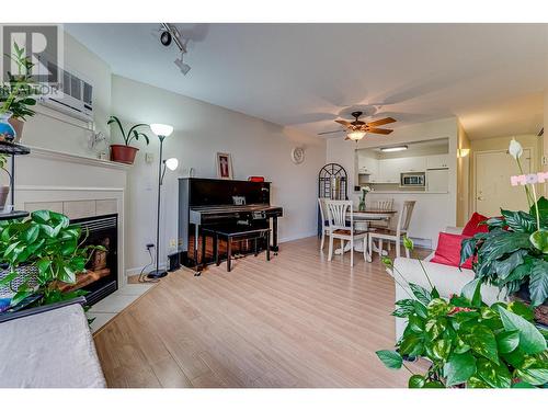 3320 Centennial Drive Unit# 409, Vernon, BC - Indoor Photo Showing Living Room With Fireplace