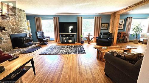 328 Dyer'S Bay Road, Miller Lake, ON - Indoor Photo Showing Living Room With Fireplace