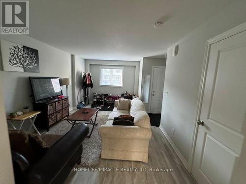 64 - 7768 Ascot Circle, Niagara Falls, ON - Indoor Photo Showing Living Room