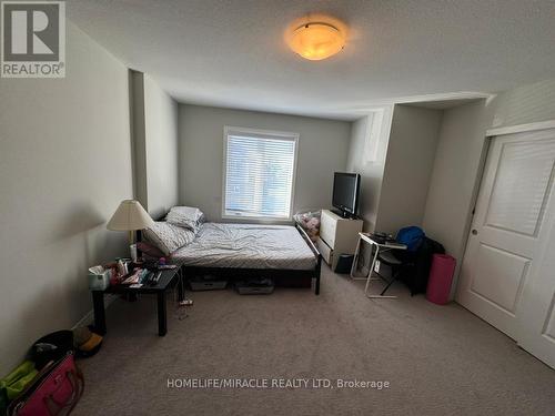 64 - 7768 Ascot Circle, Niagara Falls, ON - Indoor Photo Showing Bedroom