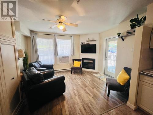 5052 Riverview Road Unit# 5007B, Fairmont Hot Springs, BC - Indoor Photo Showing Living Room With Fireplace