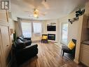 5052 Riverview Road Unit# 5007B, Fairmont Hot Springs, BC  - Indoor Photo Showing Living Room With Fireplace 