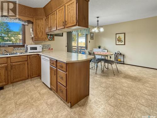 10205 Hamelin Street, North Battleford, SK - Indoor Photo Showing Kitchen With Double Sink