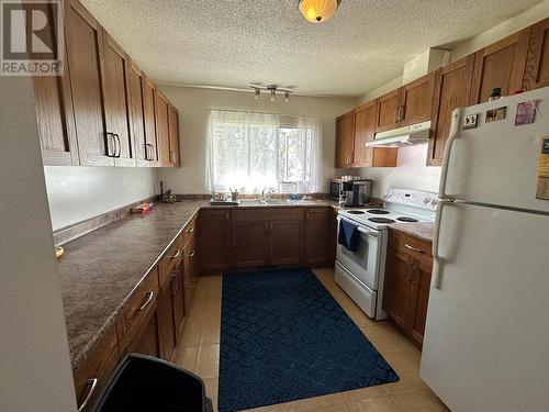 2220-2226 Upland Street, Prince George, BC - Indoor Photo Showing Kitchen With Double Sink