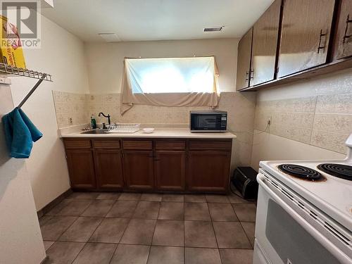 2220-2226 Upland Street, Prince George, BC - Indoor Photo Showing Kitchen With Double Sink