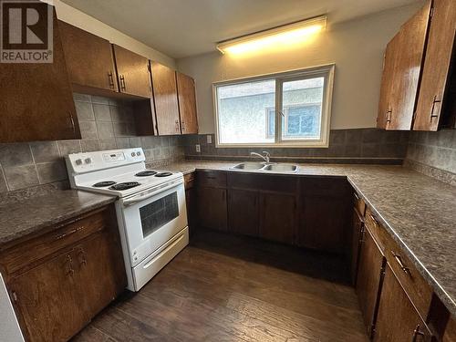 2220-2226 Upland Street, Prince George, BC - Indoor Photo Showing Kitchen With Double Sink