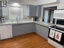 319 Alberta Avenue, Kerrobert, SK  - Indoor Photo Showing Kitchen With Double Sink 