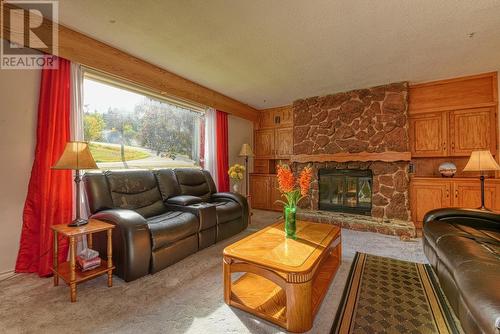 102 Conrad Crescent, Williams Lake, BC - Indoor Photo Showing Living Room With Fireplace