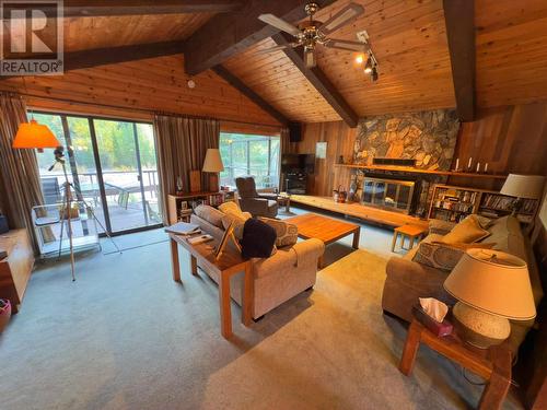 153 Rivers End Road, Princeton, BC - Indoor Photo Showing Living Room With Fireplace