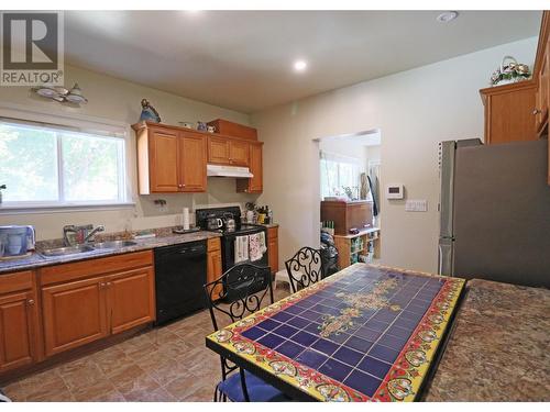 1726 72Nd Avenue, Grand Forks, BC - Indoor Photo Showing Kitchen With Double Sink