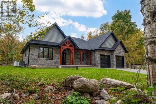 11 Maplewood Court, Galway-Cavendish And Harvey, ON - Outdoor With Facade