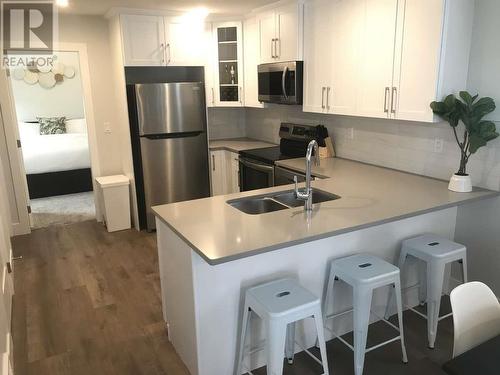 667 Victoria Drive Unit# 102, Penticton, BC - Indoor Photo Showing Kitchen With Stainless Steel Kitchen With Double Sink