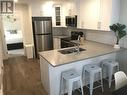 667 Victoria Drive Unit# 102, Penticton, BC  - Indoor Photo Showing Kitchen With Stainless Steel Kitchen With Double Sink 