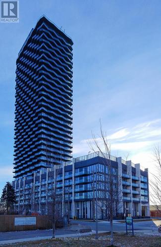 211 - 36 Zorra Street, Toronto, ON - Outdoor With Facade