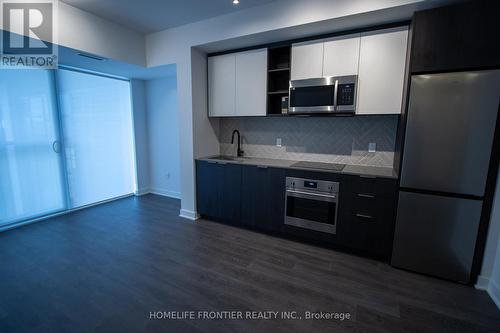 211 - 36 Zorra Street, Toronto, ON - Indoor Photo Showing Kitchen