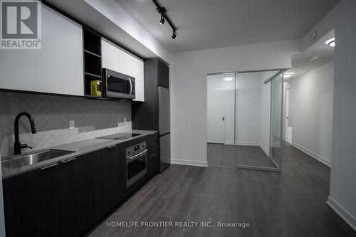 211 - 36 Zorra Street, Toronto, ON - Indoor Photo Showing Kitchen